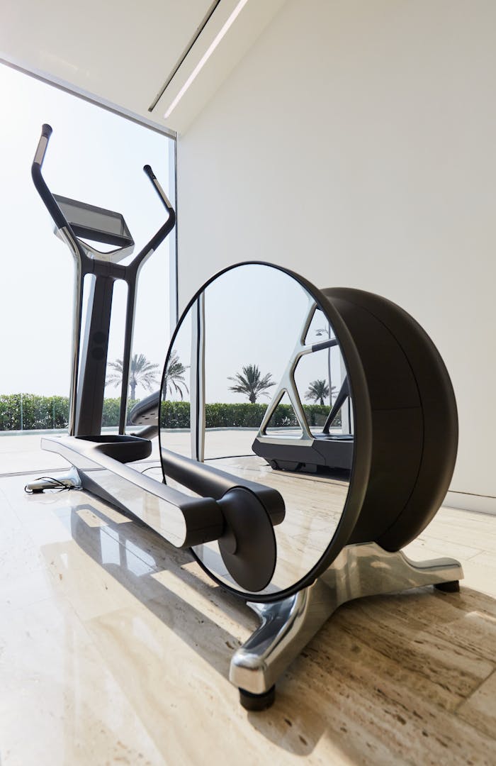 Exercise bike in a gym with bay windows