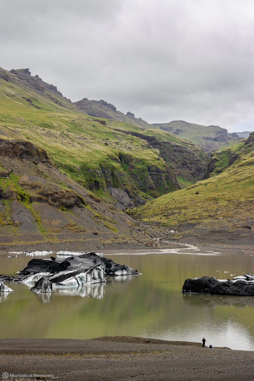 Typical Landscape of Iceland with a person bottom right showing the scale of the landscape