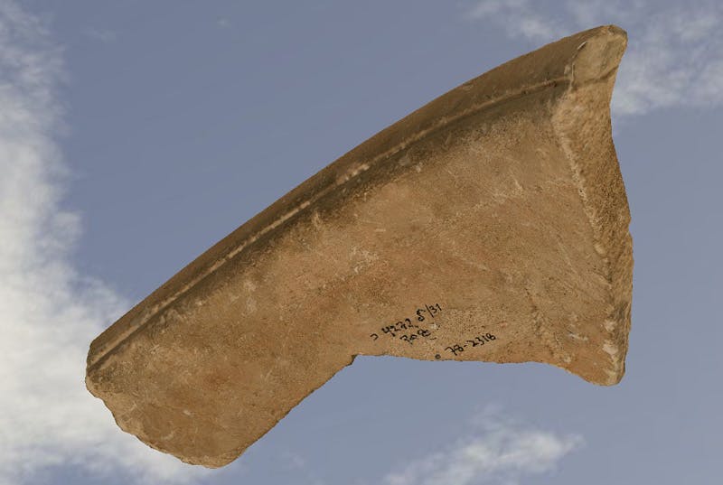 Fragment of a limestone jar, onto which the name "Yosef" is etched.