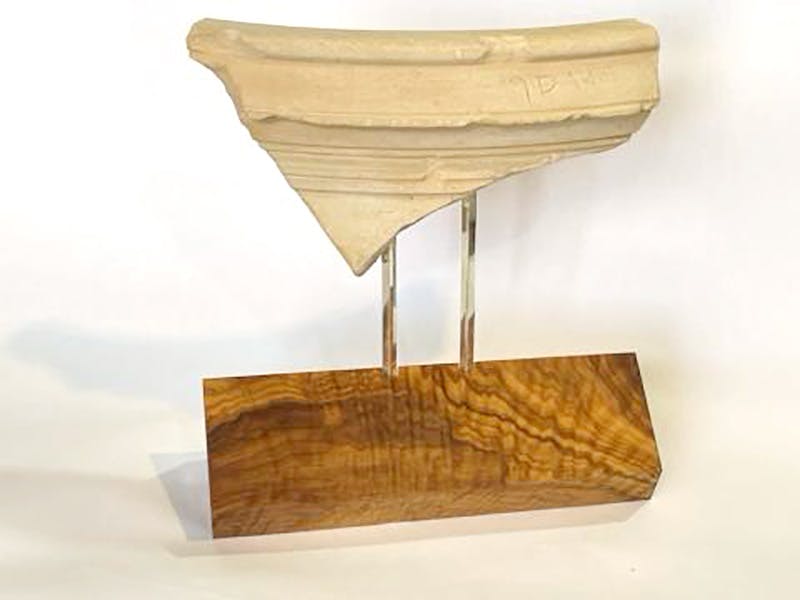 Fragment of a limestone jar, onto which the name "Yosef" is etched.