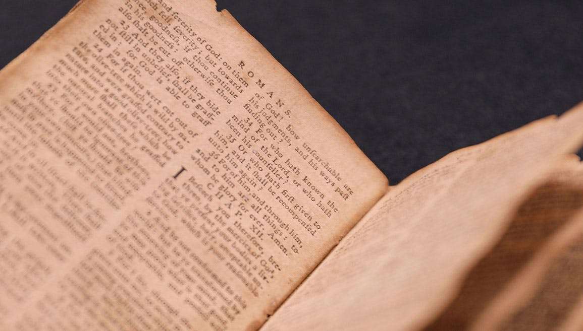 Bible open to the book of Romans