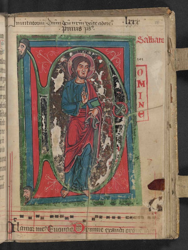 Buxheim Psalter, image before Psalm 101, featuring Jesus standing with his right hand raised in blessing and left hand holding a book in the fold of his robe.