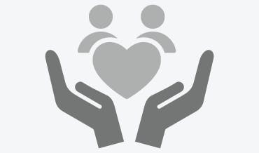 Stylized icon of two hands cradling a heart and two people.