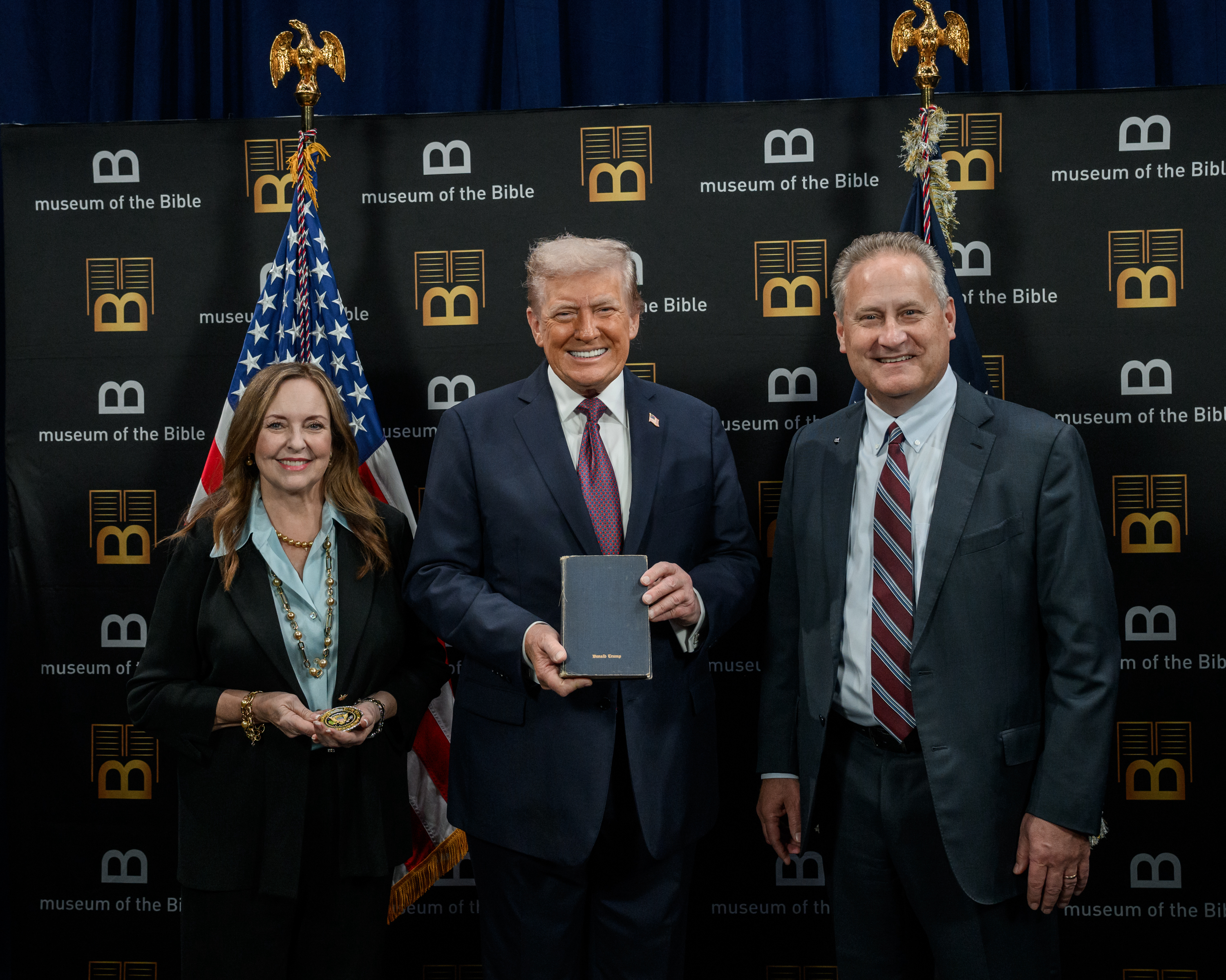 Jackie Green, President Trump, and Steve Green.