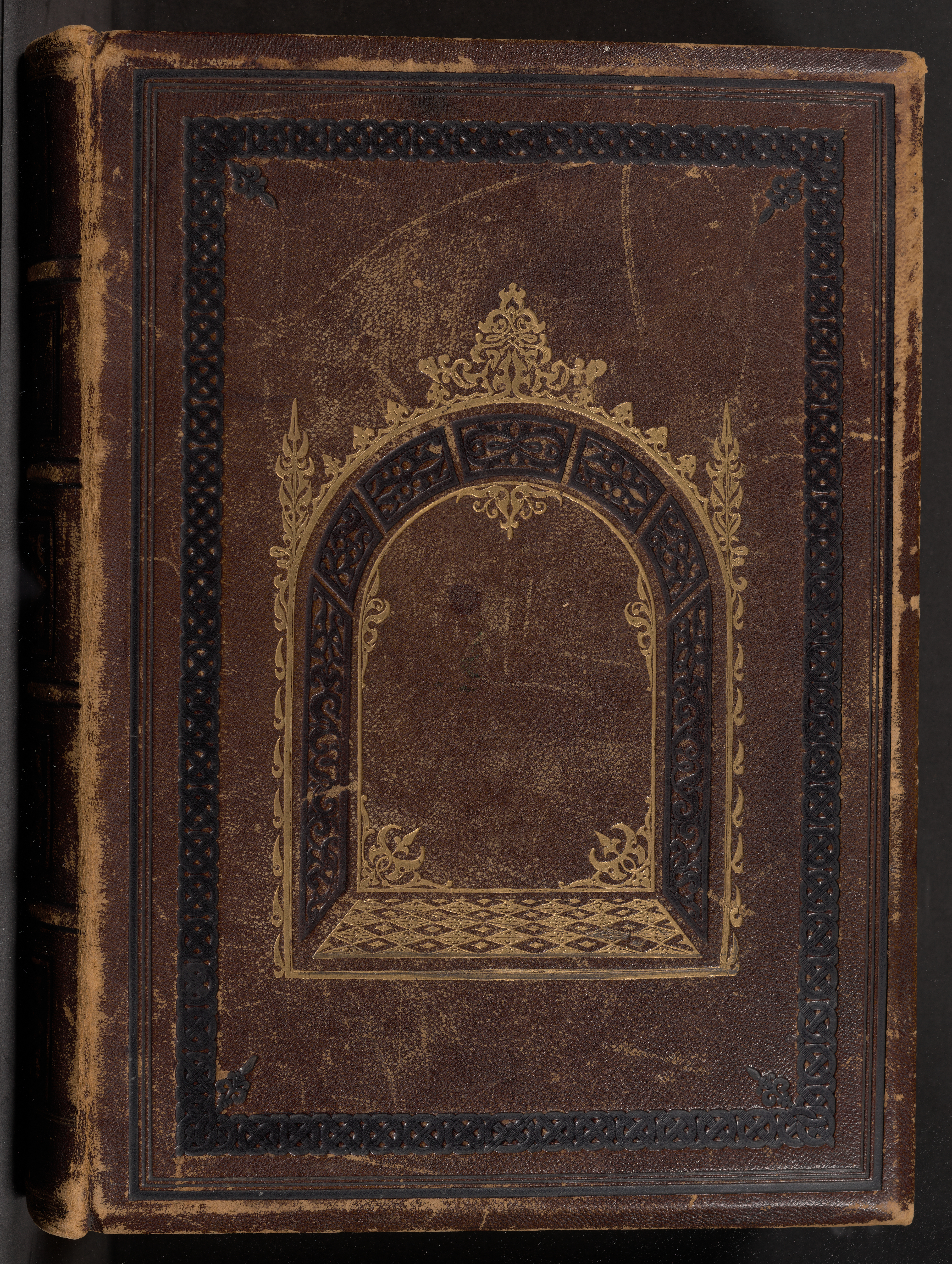 Brown cover of the McDougald Devotional Family Bible