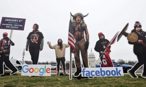 Protestors portray Zuckerberg as the infamous “QAnon Shaman” Credit: Jonathan Ernst/Reuters