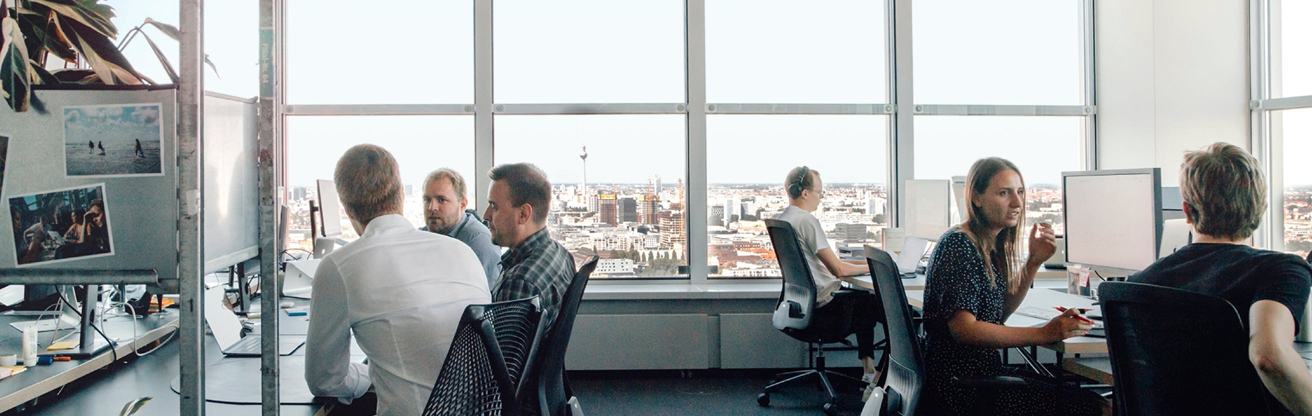 The MVPF team in their Berlin office with view over the Berlin TV tower