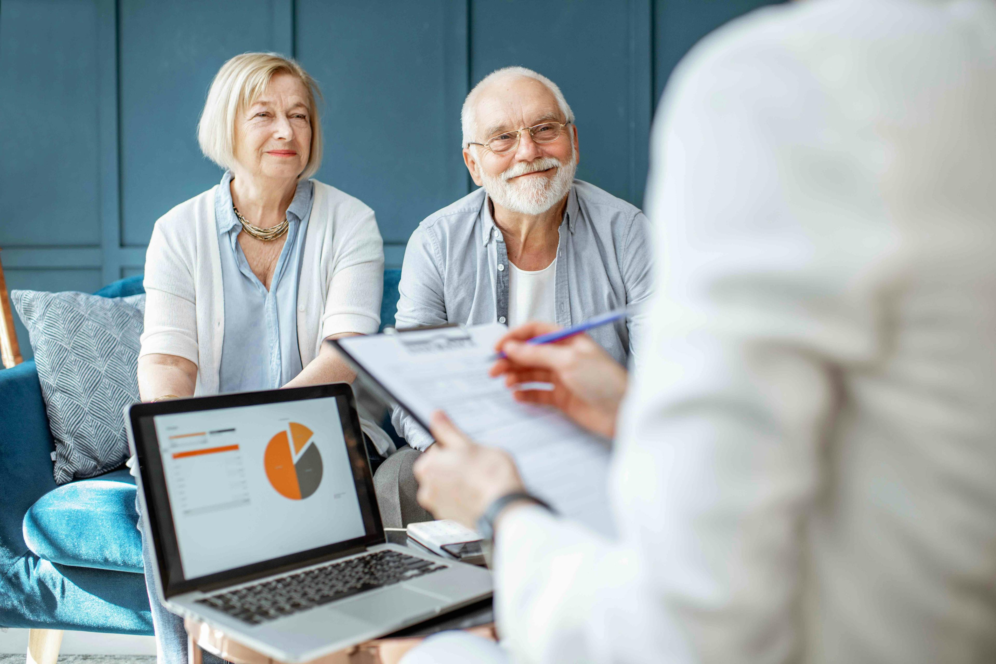 couple meeting with retirement coach