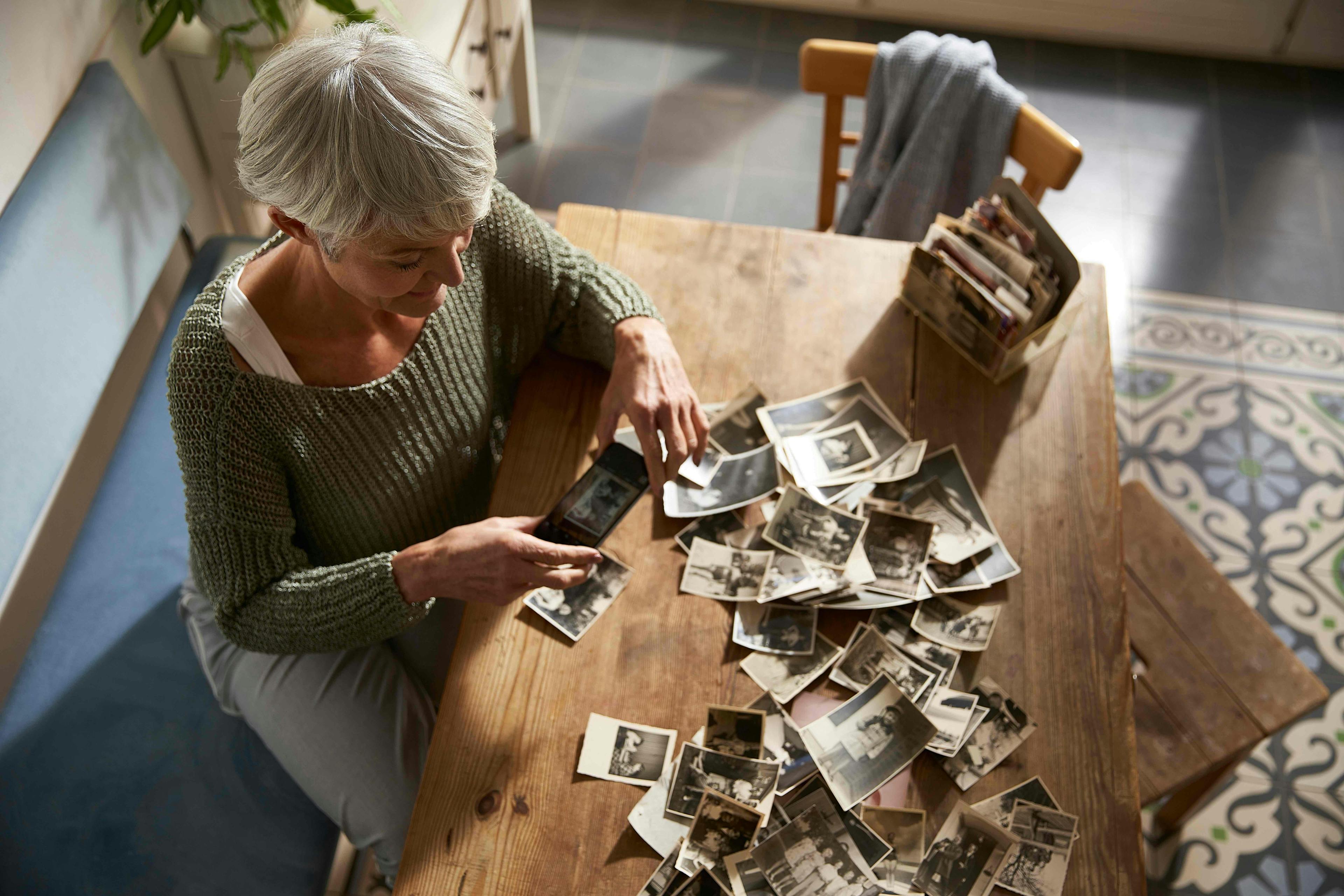 woman sorting photos