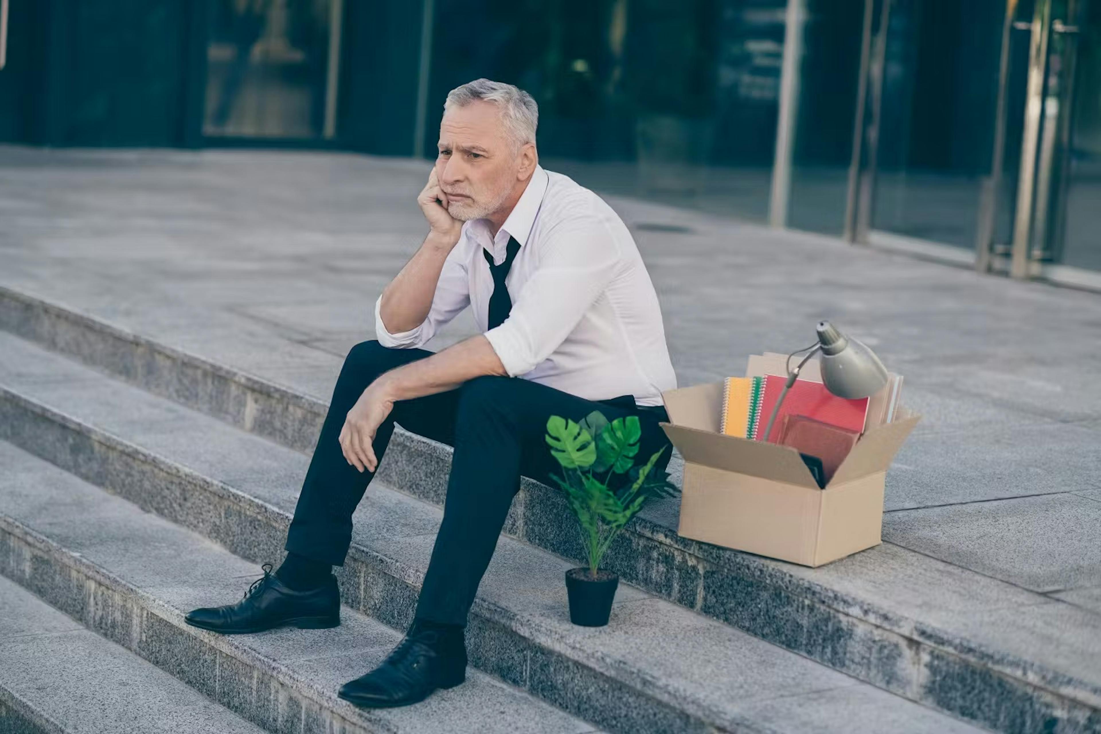 Man sitting with box
