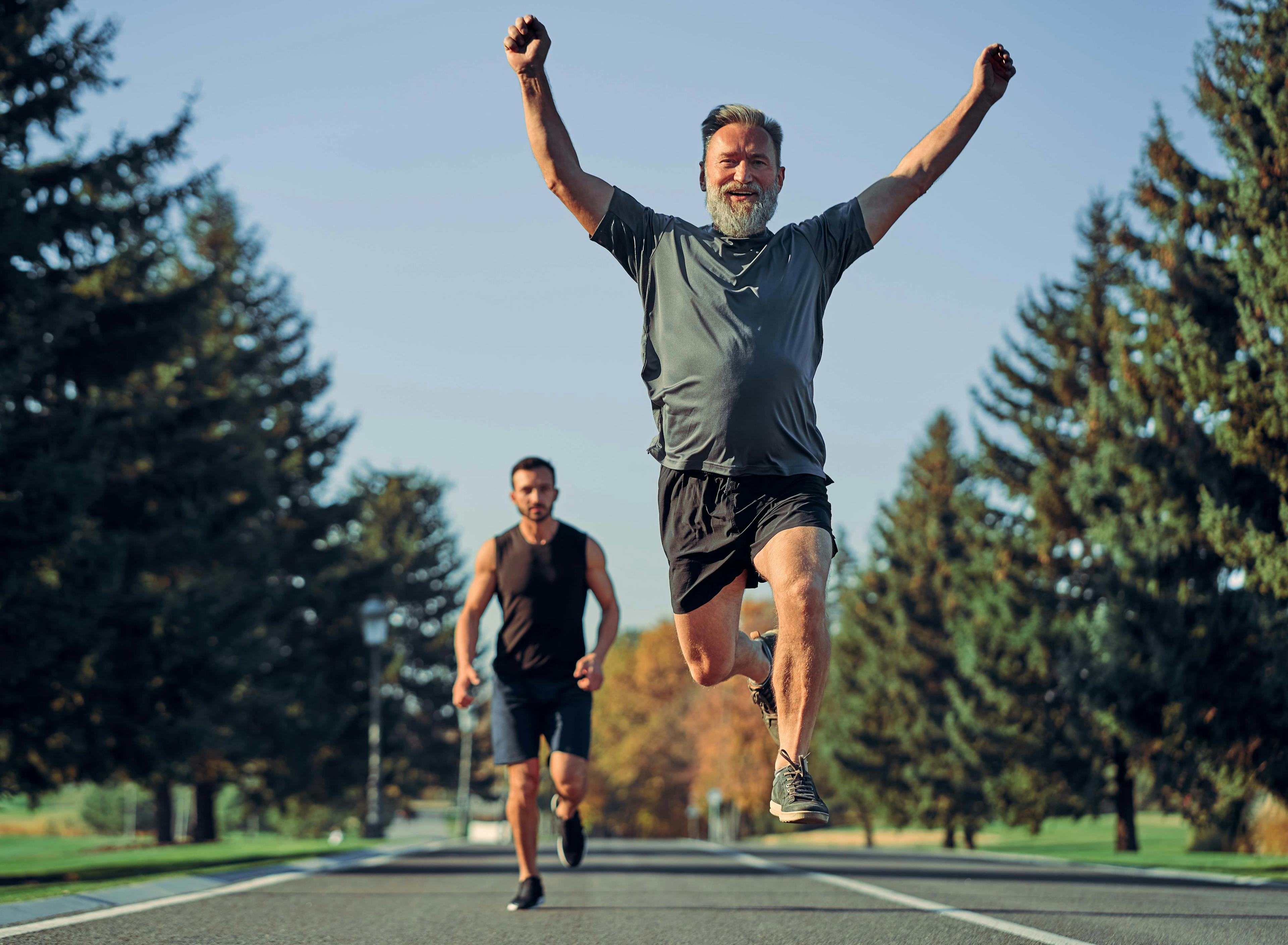 Man jumping up while running