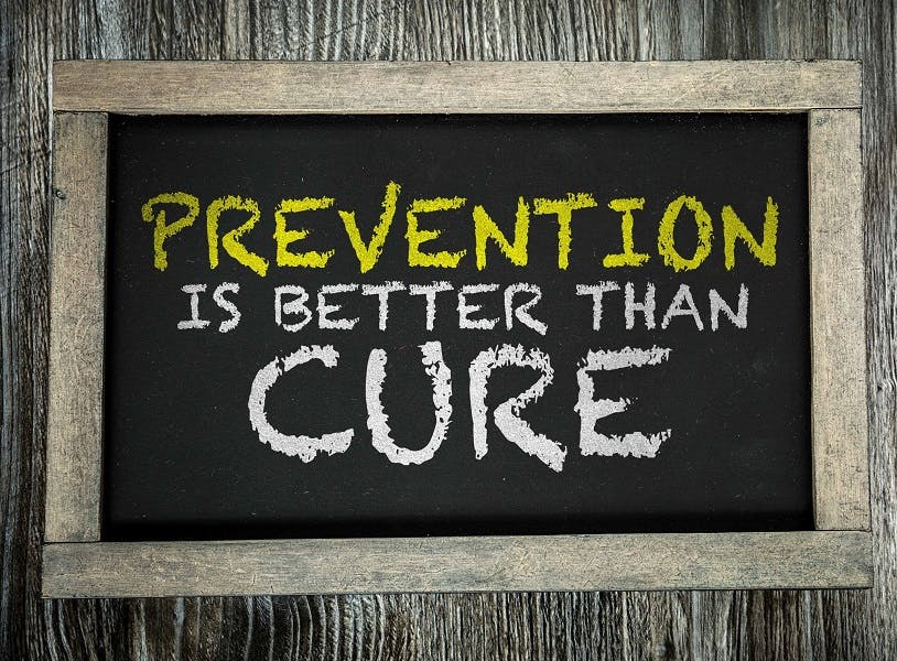 Chalkboard with the copy Prevention is better than Cure