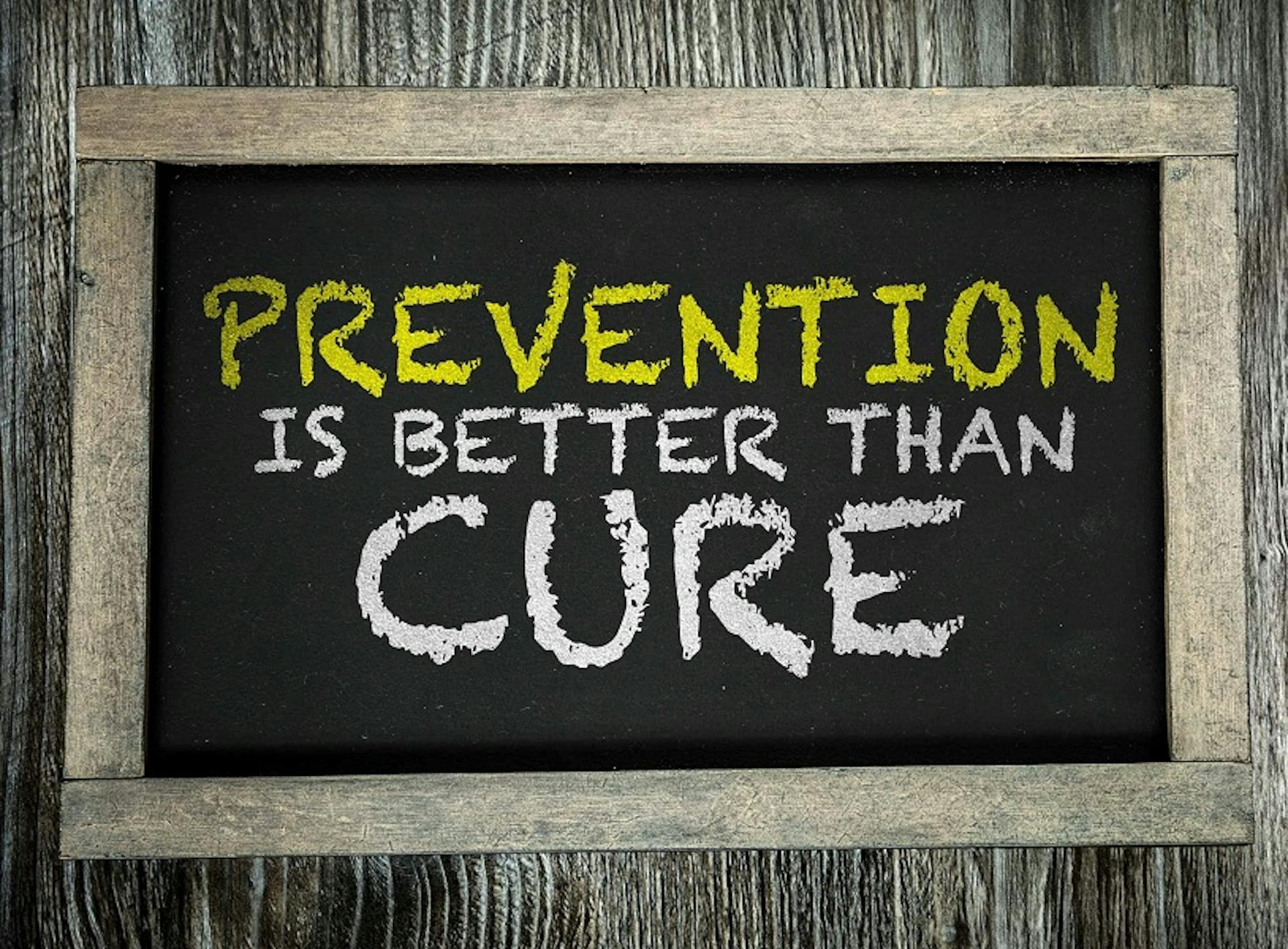 Chalkboard with the copy Prevention is better than Cure