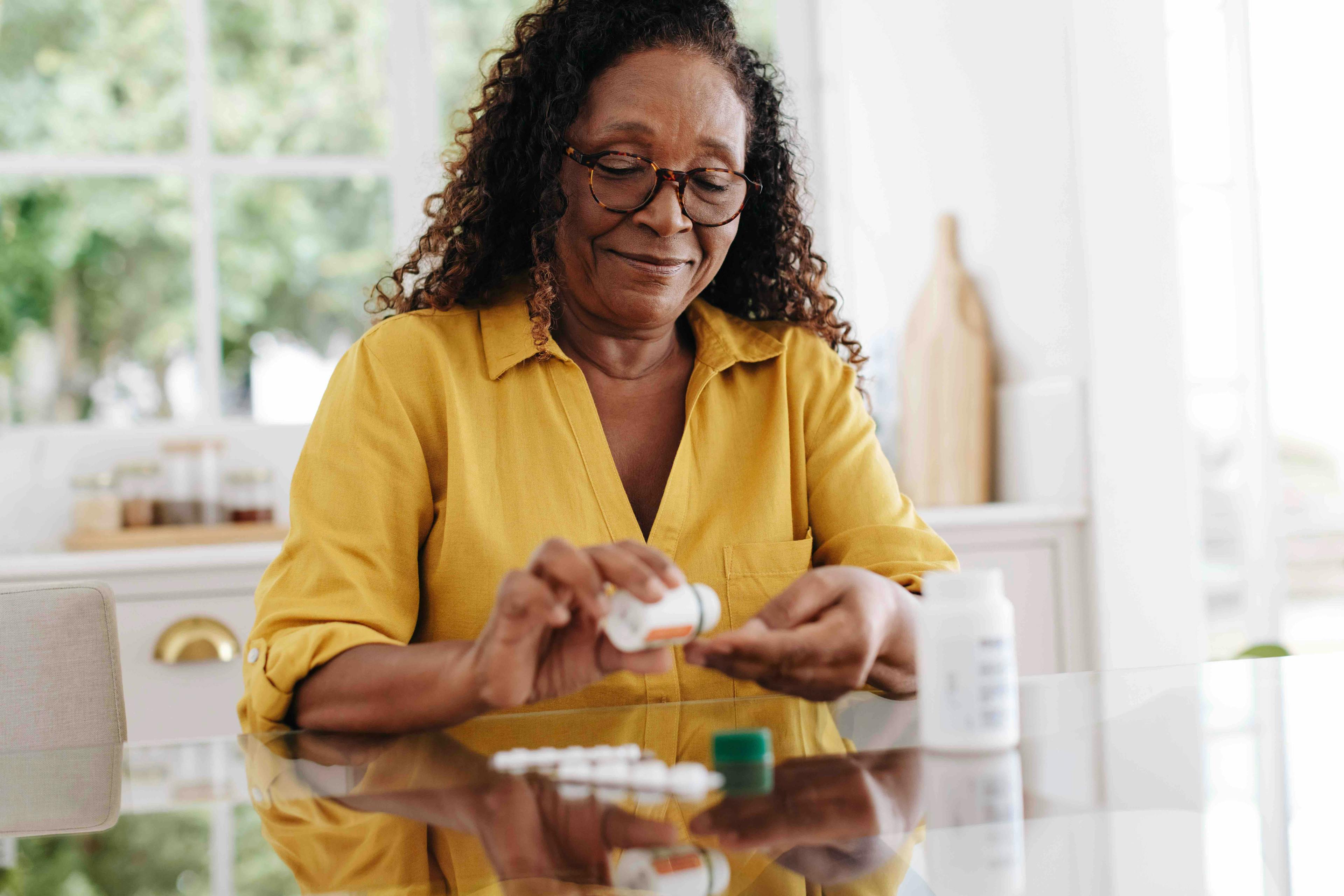 Senior woman taking prescription