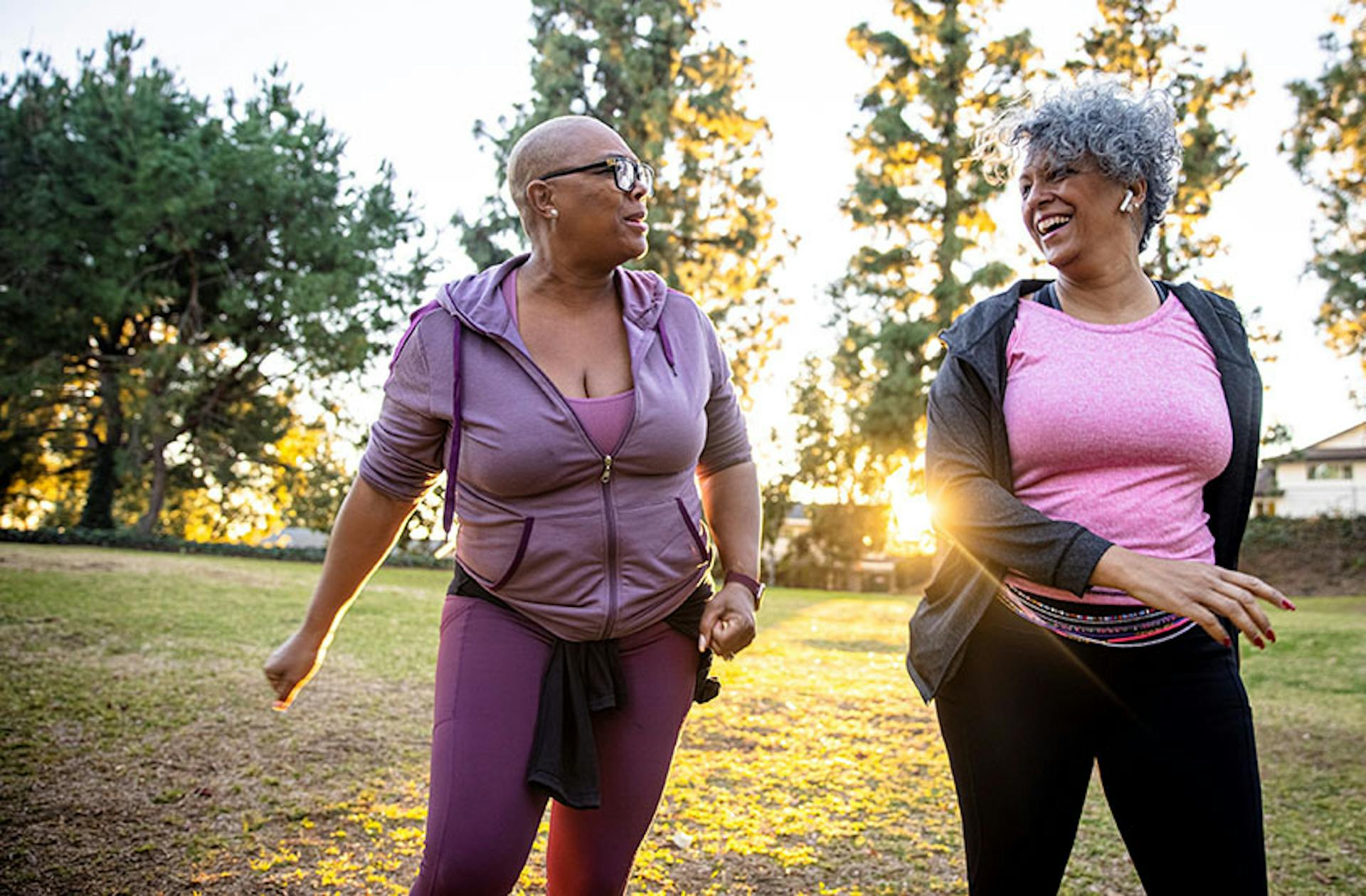 Two women walking in the park