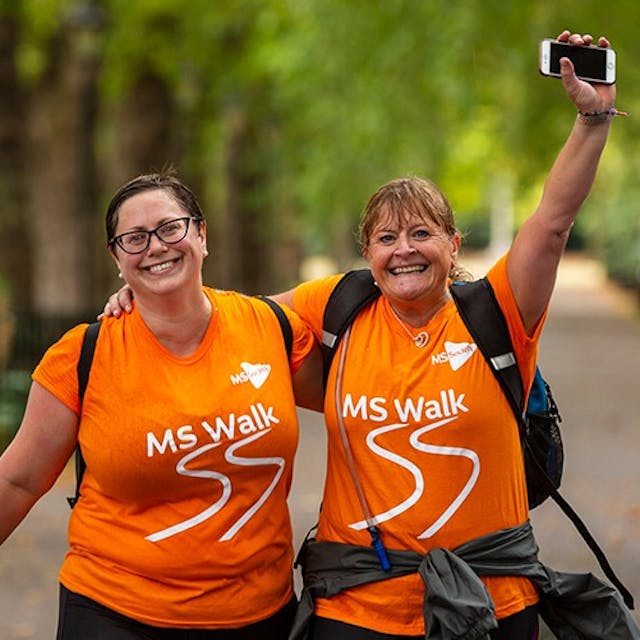 Image of two smiling MS Society supporters