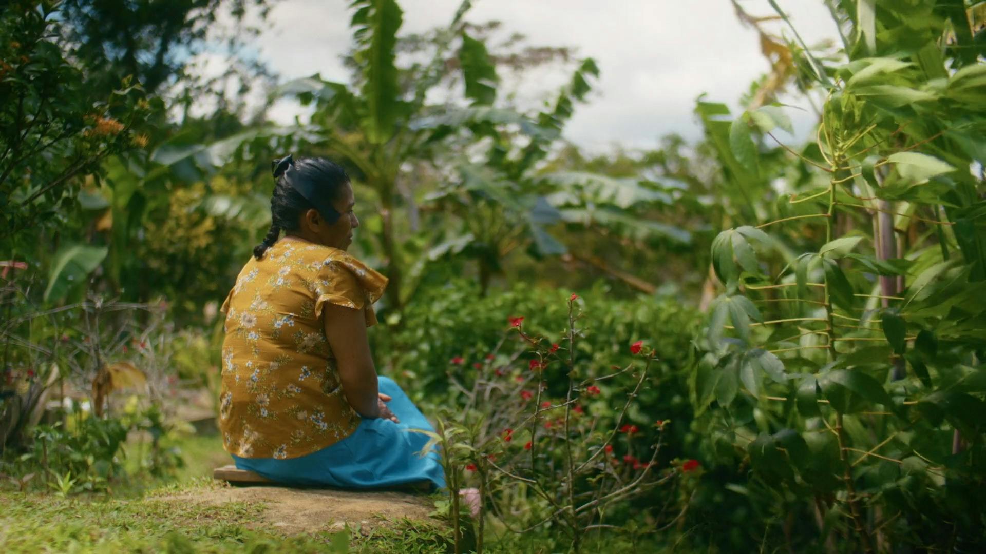 Woman sitting on the ground