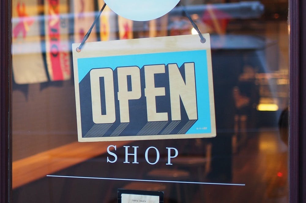 Open sign on a window