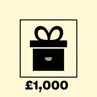 Christmas present on a peach background with £1000 in text