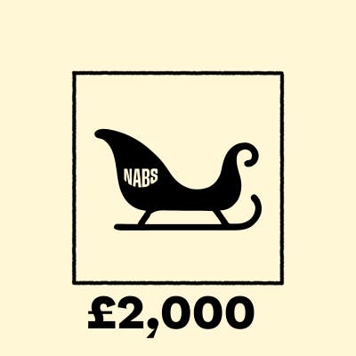 Sleigh on a peach background with £2000 in text