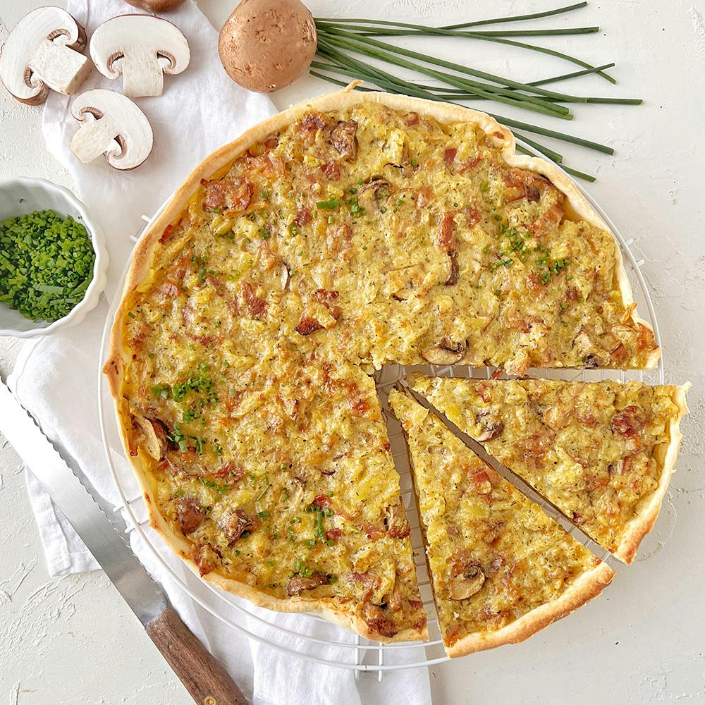 Recette de quiche aux pommes de terre, aux champignons et aux lardons