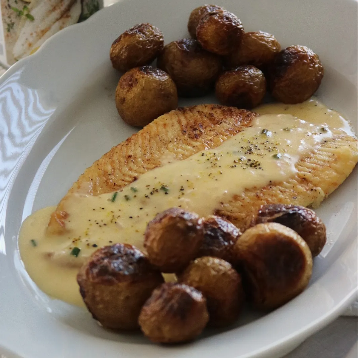 Pesce bianco aromatico al pepe al limone