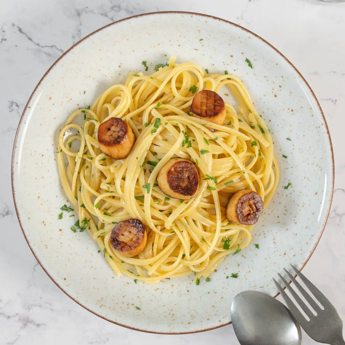 Linguine mit Pilz-Muscheln in Weissweinsauce