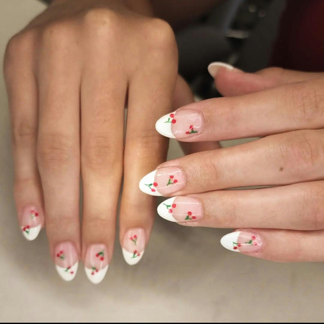 Nails painted with cherry blossom