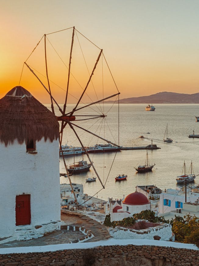 Windmills and small town in Mykonos