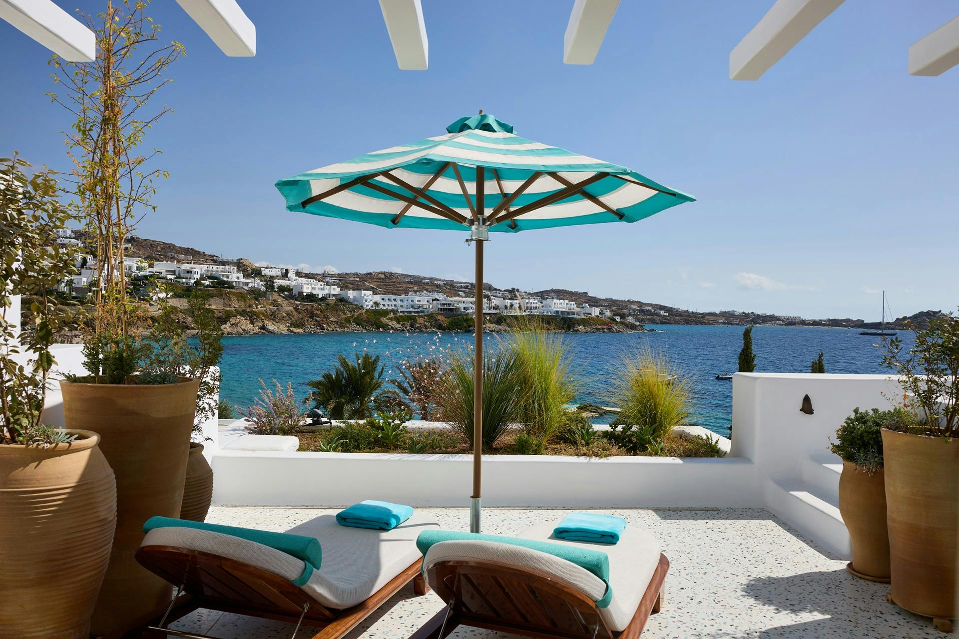 Terrace overlook the Aegean Sea at Nammos Hotel Mykonos luxury rooms 