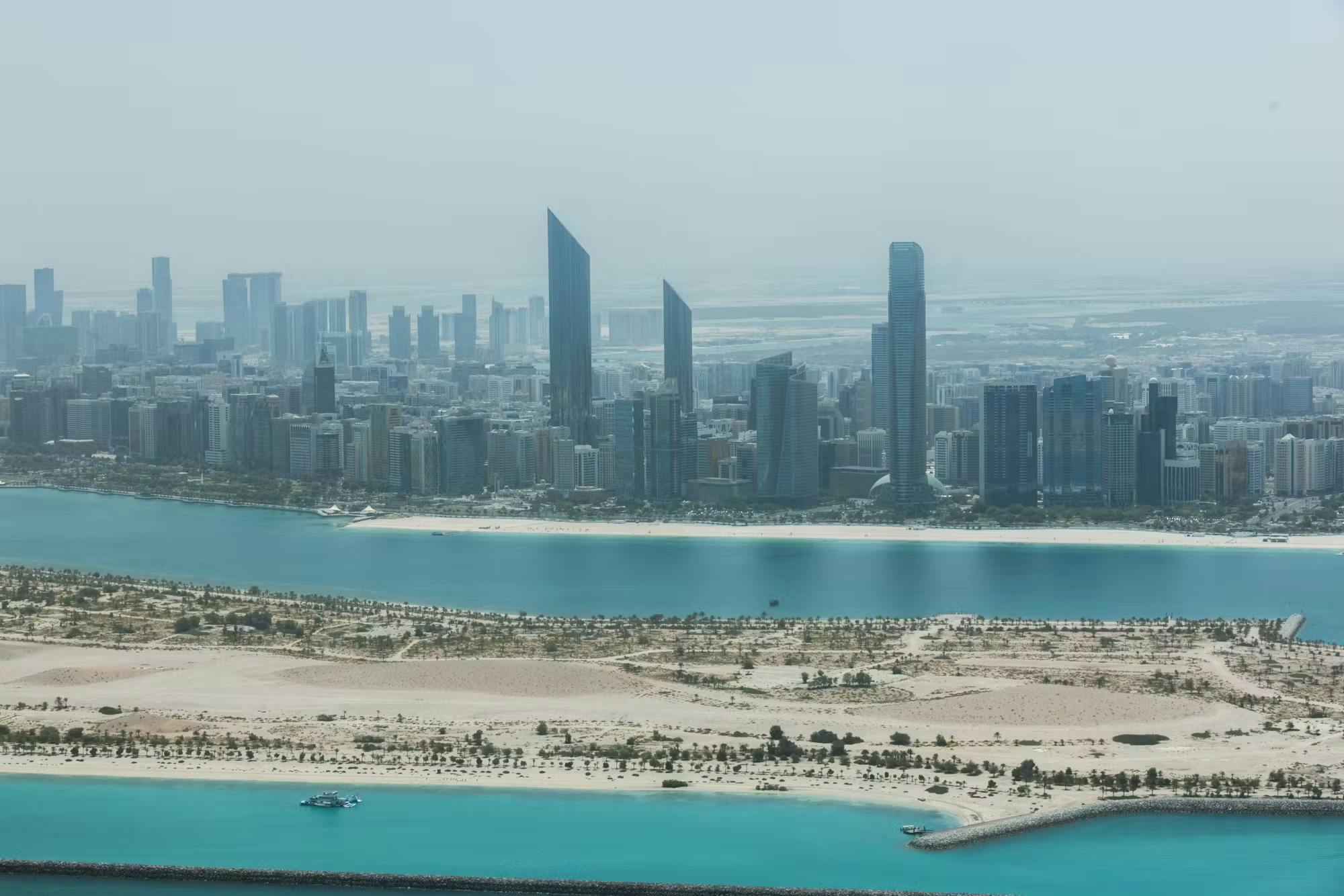 Birds eye view of beach and buildings in Abu Dhabi