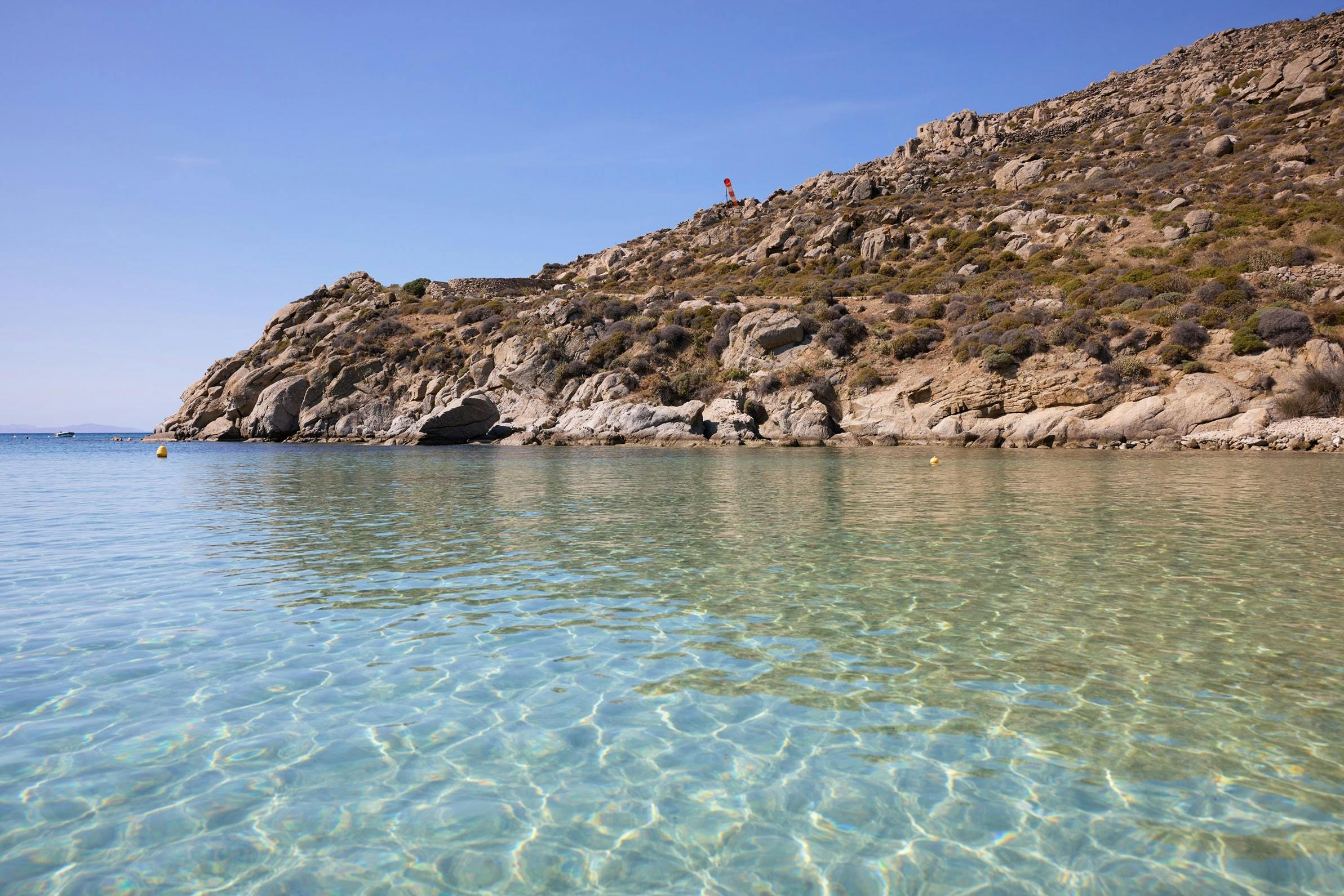 Aegean Sea with rocks behind at Nammos beach 