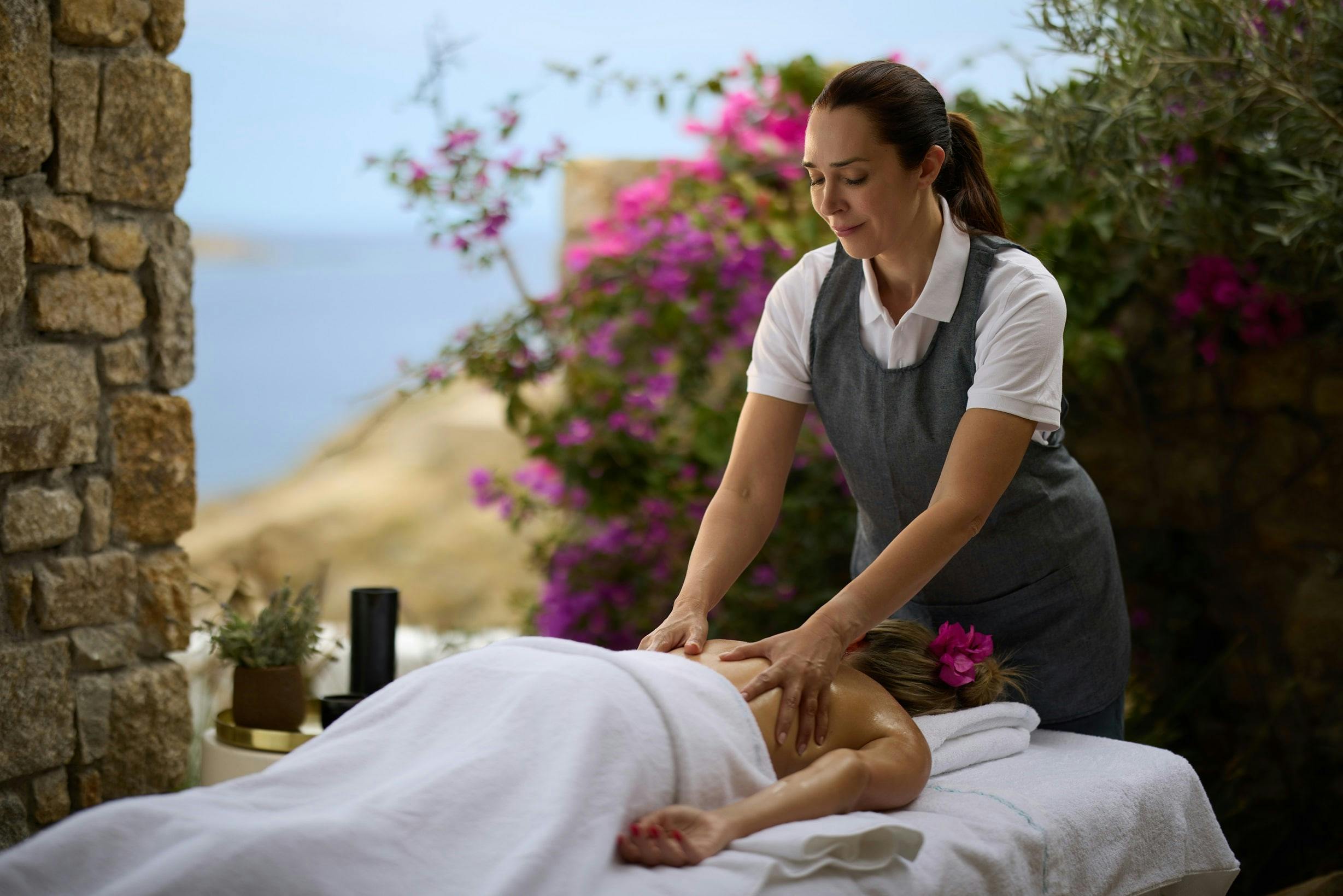 Lady having a massage at Nammos Spa