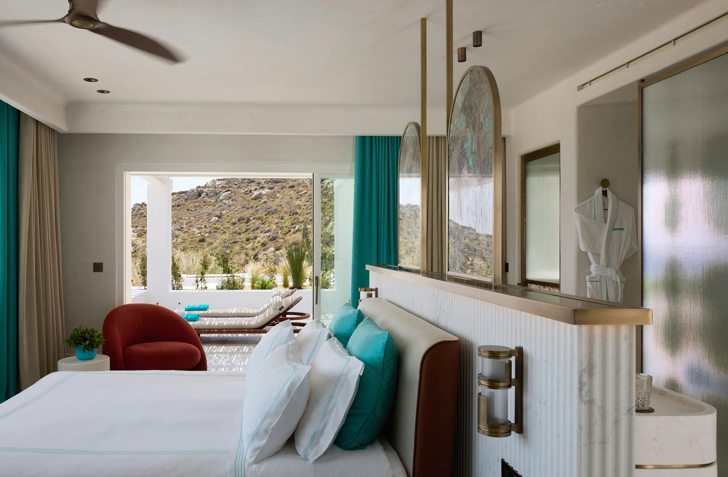 Bed room with terrace overlooking Mykonos mountains