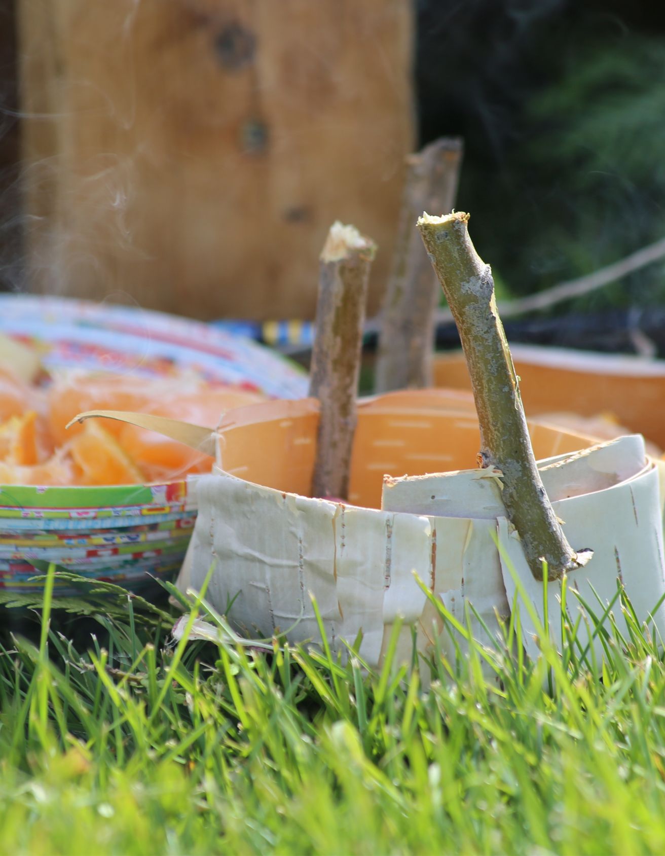 Close up shot of ceremonial items placed in the grass