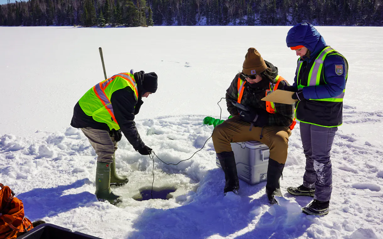 Guardians on a frozen lake monitoring the water