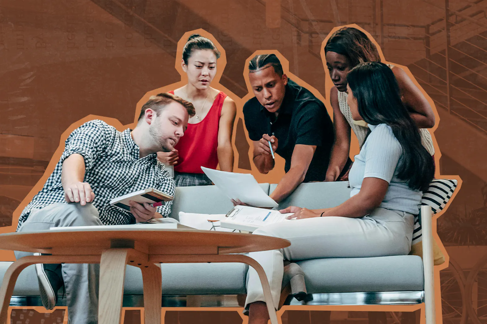 A diverse group of individuals gathered around a table, focused on a piece of paper as they share ideas and work together.