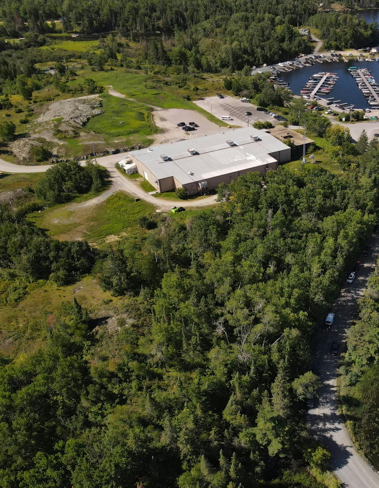 Aerial view of the bingo hall and boat dock in Wauzhushk Onigum First Nation