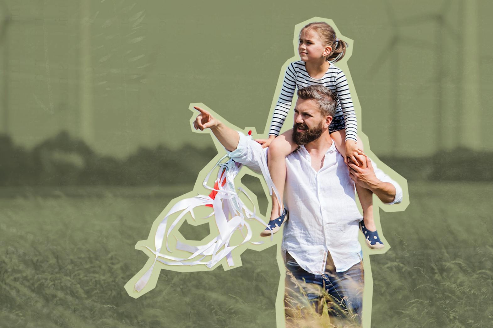 A man pointing into the distance with a child on his shoulders, standing in front of several large wind turbines against a clear blue sky.