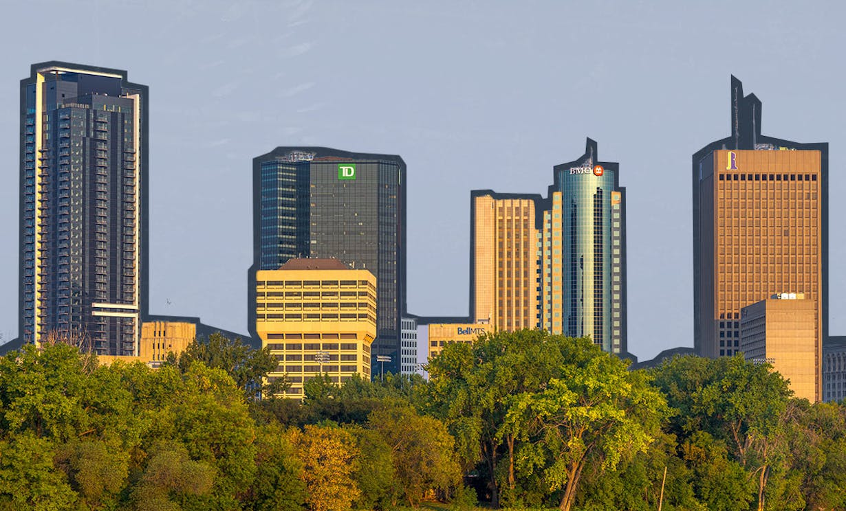 Winnipeg skyline with a river at sunrise