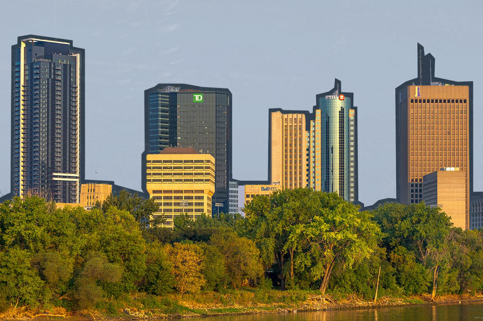 Winnipeg skyline with a river at sunrise