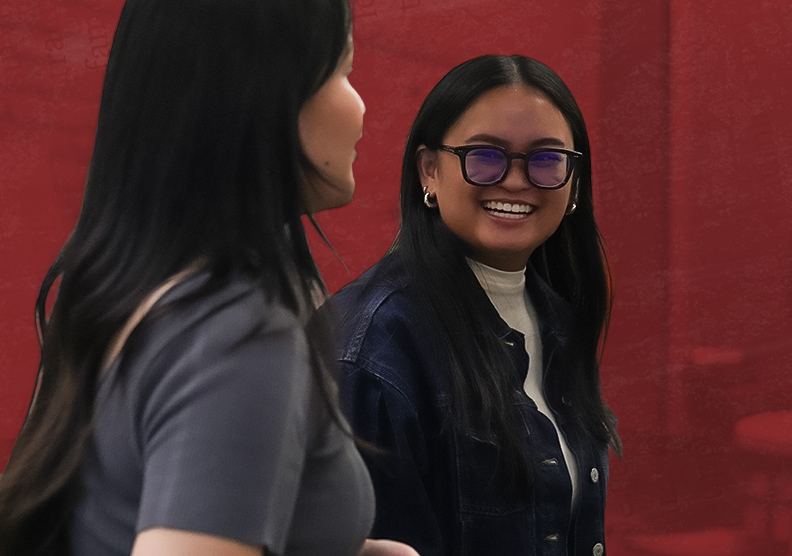 Feabie Medina looks back and is smiling at Fiona David