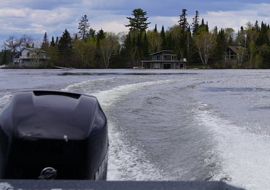 Motorboat driving through a body of water