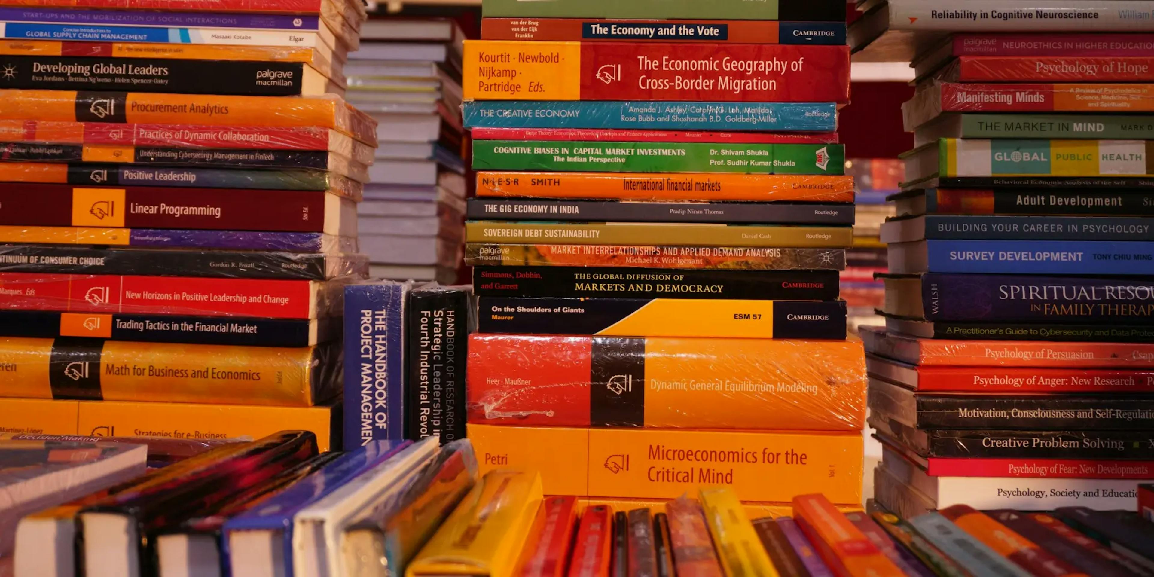 Picture of a bunch of books piled on top of each other