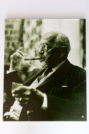 Well-dressed man with cigar