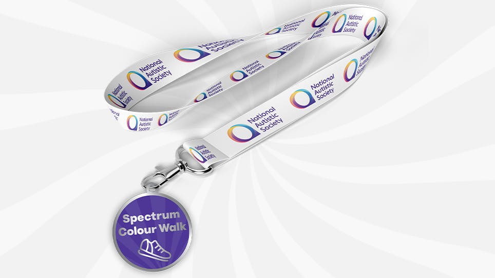 A blue National Autistic Society participation medal