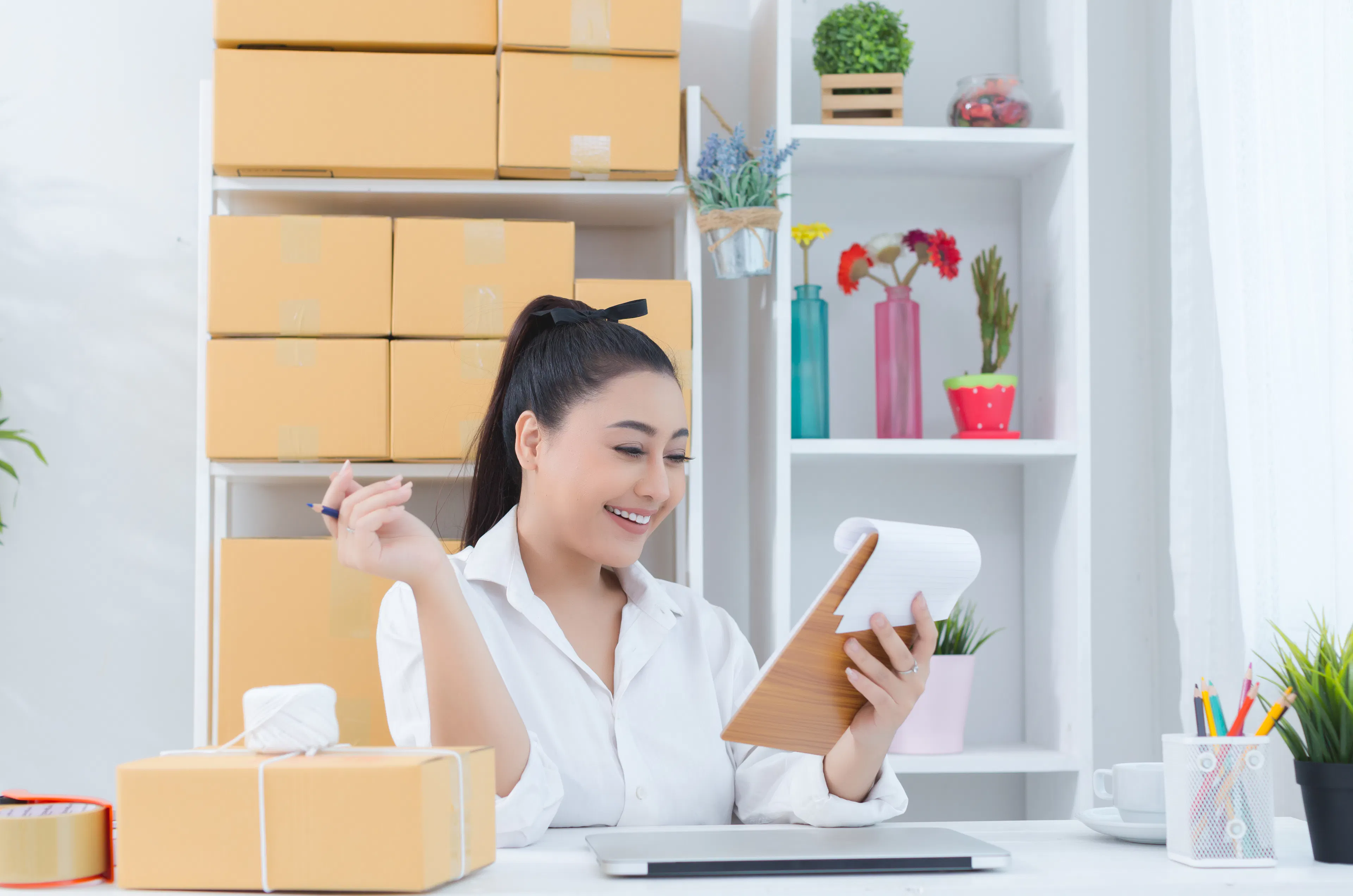 e-commerce business owner working home office