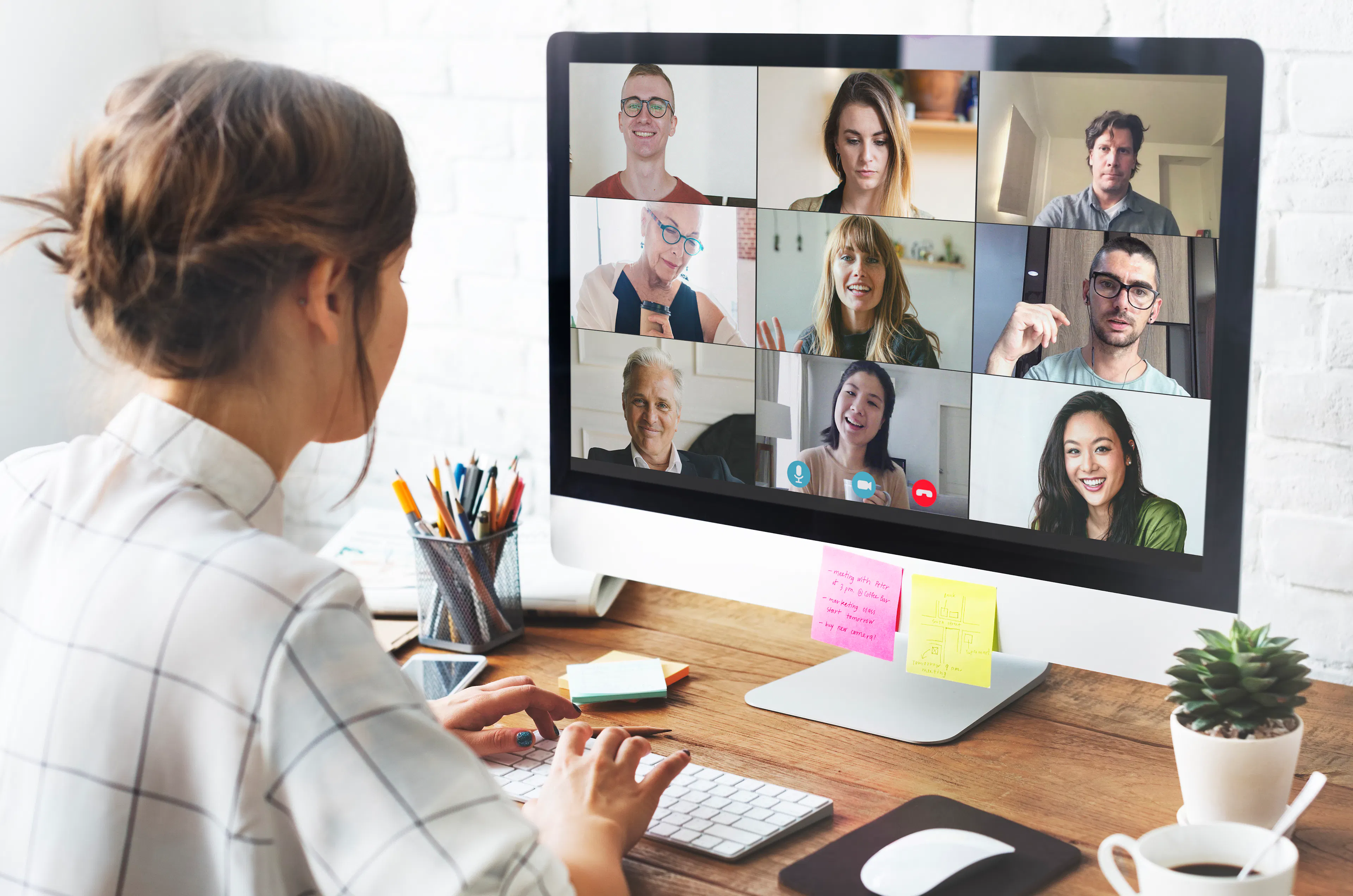 Virtual office with remote team members in a business meeting