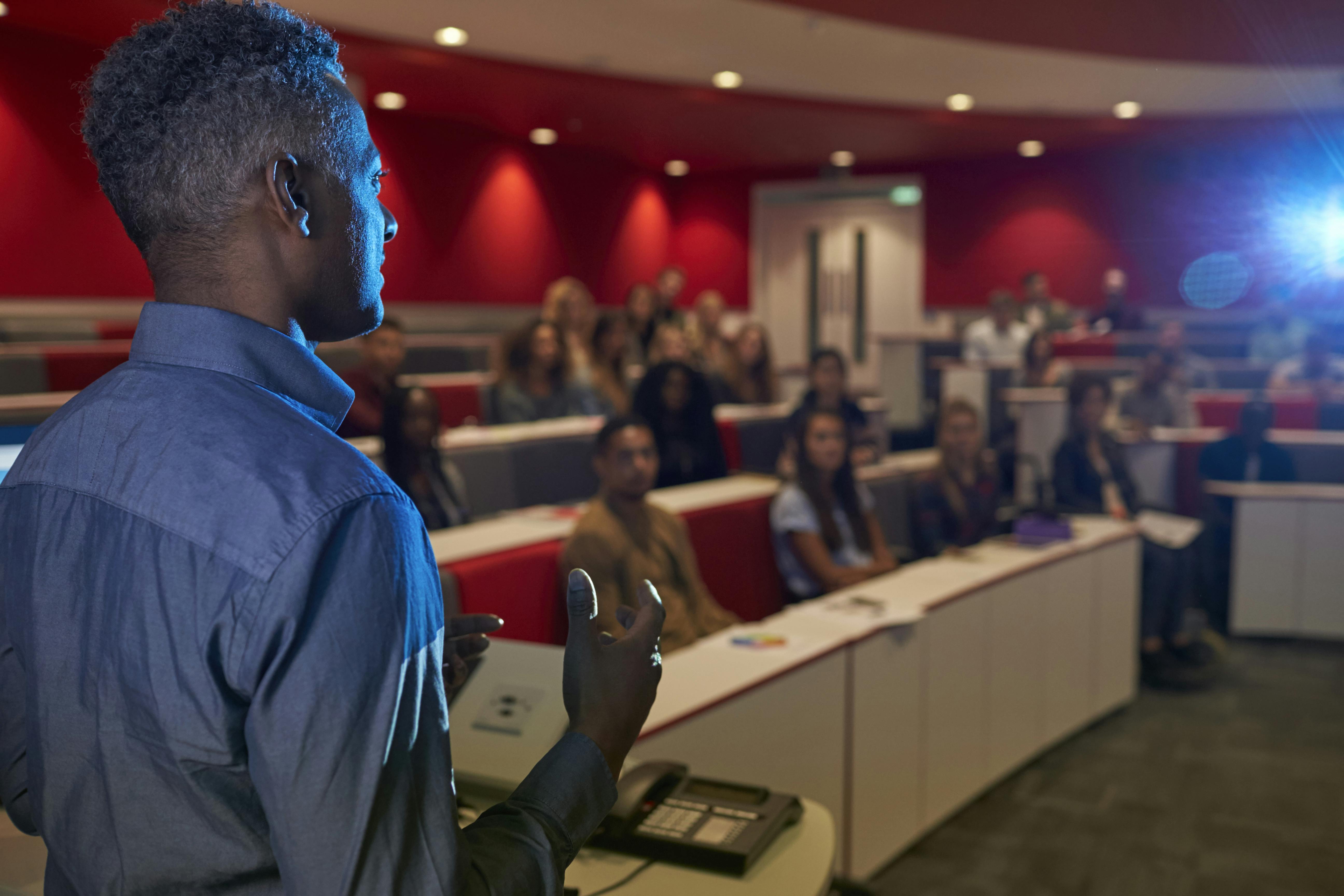 man-lecturing-students-in-a-university