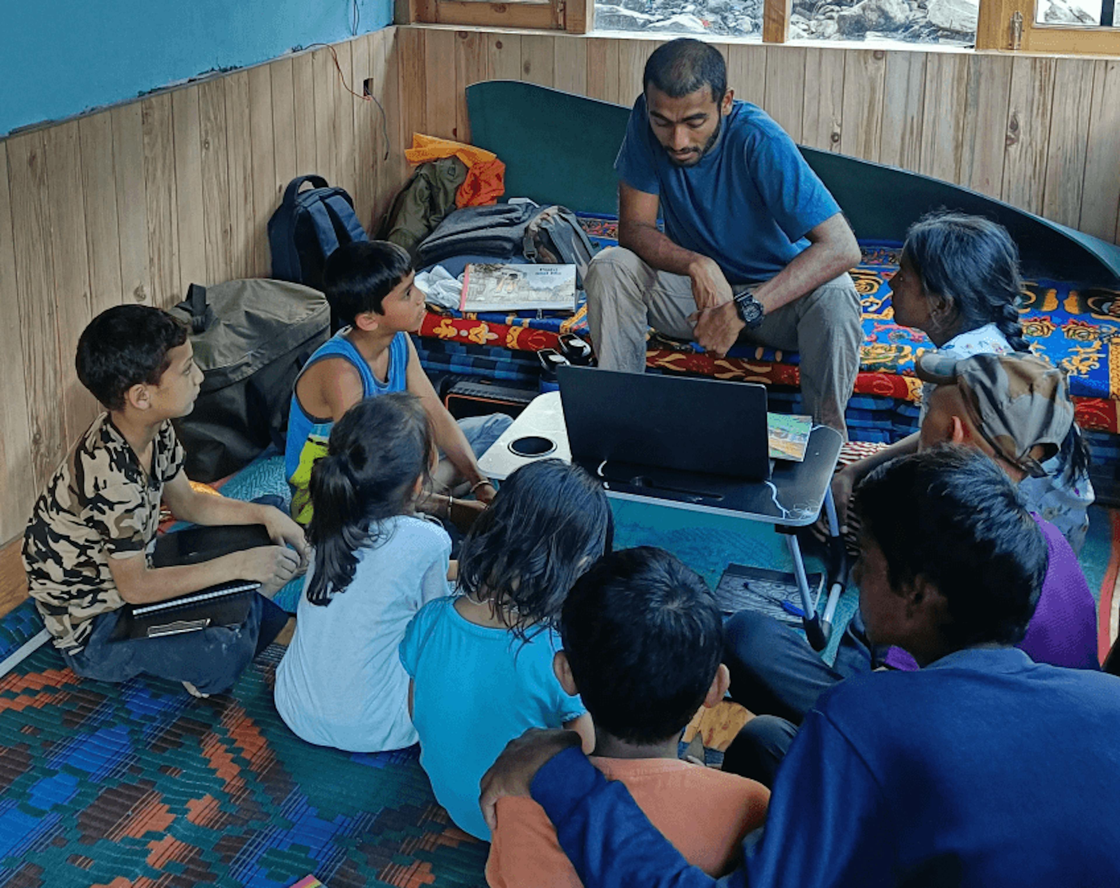 Founder Parth Phalke teaching a group of children